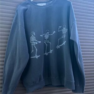 UO crewneck skeletons skating